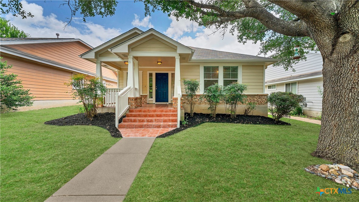 760 Scrutchins Road Kyle, TX 78640 - Photo 1 of 1 a front view of a house with garden
