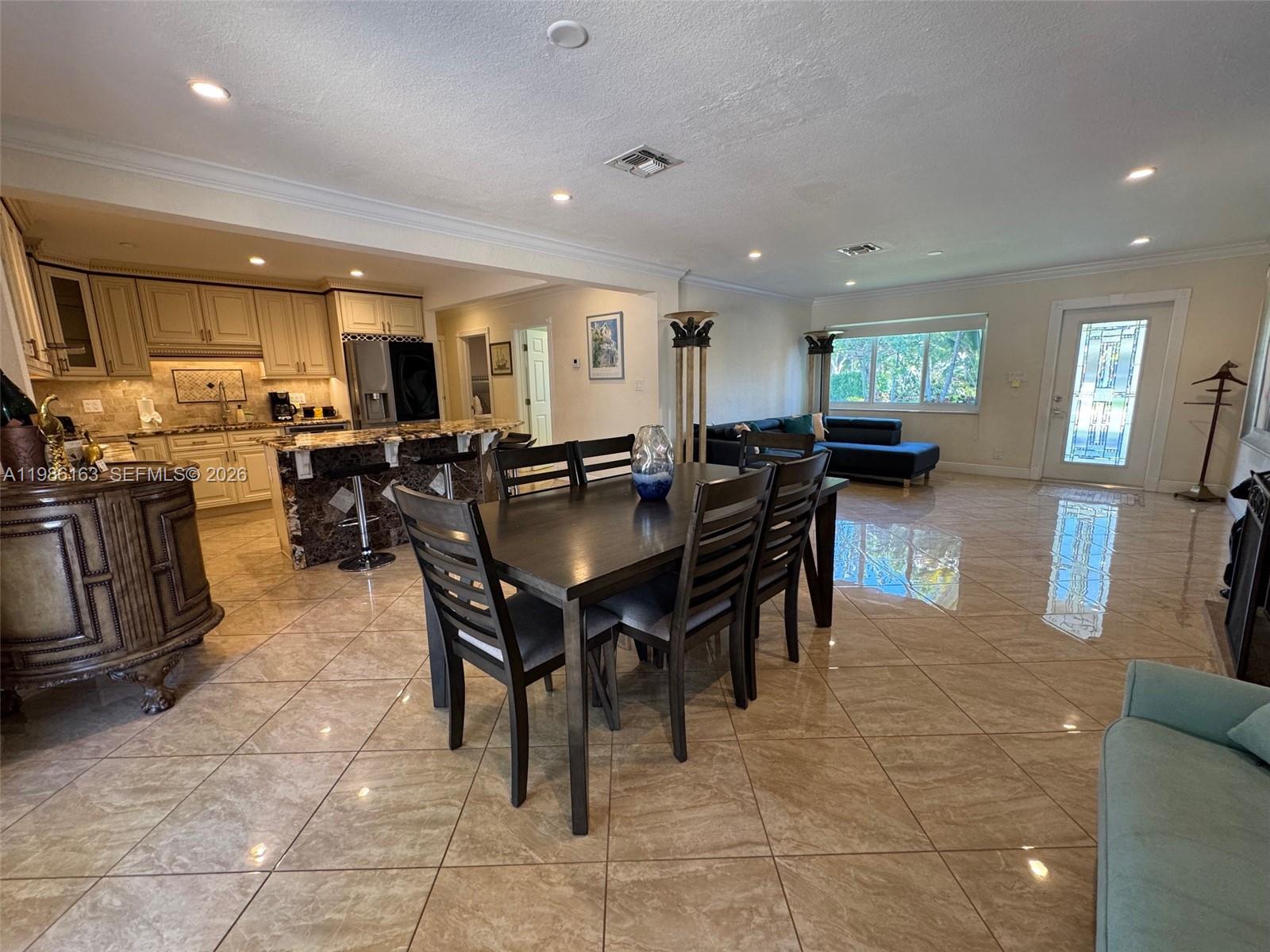 2355 Southeast 7th Street Pompano Beach, FL 33062 - Photo 13 of 31 a view of a dining area with furniture