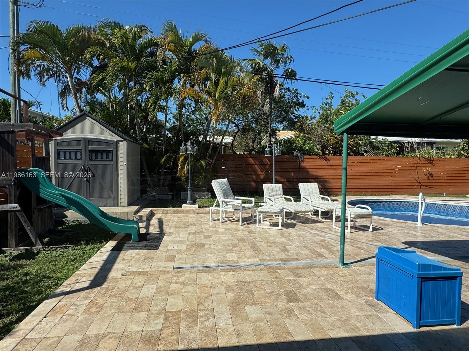 2355 Southeast 7th Street Pompano Beach, FL 33062 - Photo 30 of 31 a view of a backyard with sitting area
