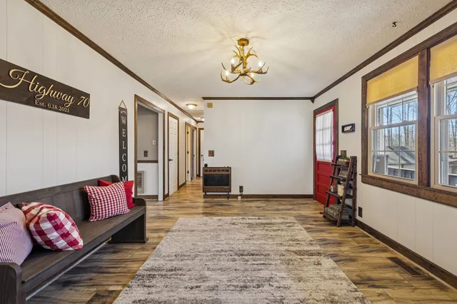 a kitchen with a refrigerator a stove a sink and a refrigerator