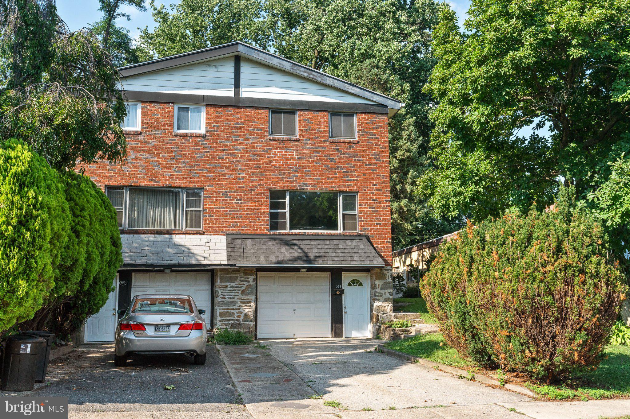 205 Juniper Road, Unit 288 Havertown, PA 19083 - Photo 1 of 28 Charming brick duplex with lush greenery.
