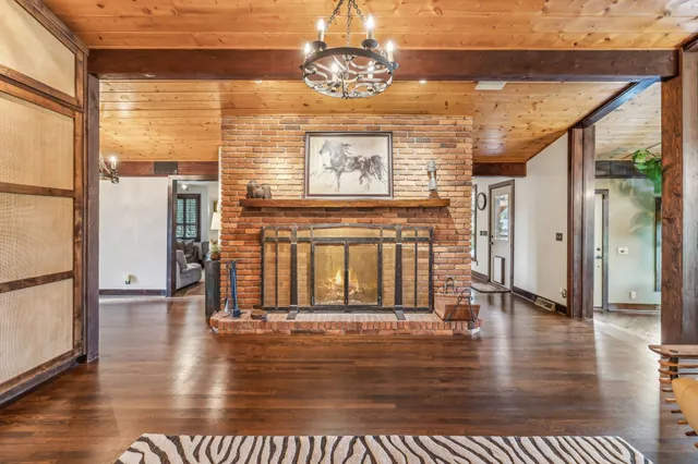 a room with furniture and a wooden floor