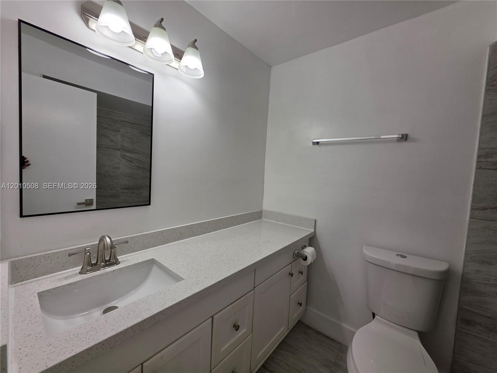 14775 Southwest 83rd Lane, Unit 14775 Miami, FL 33193 - Photo 8 of 26 hallway bathroom