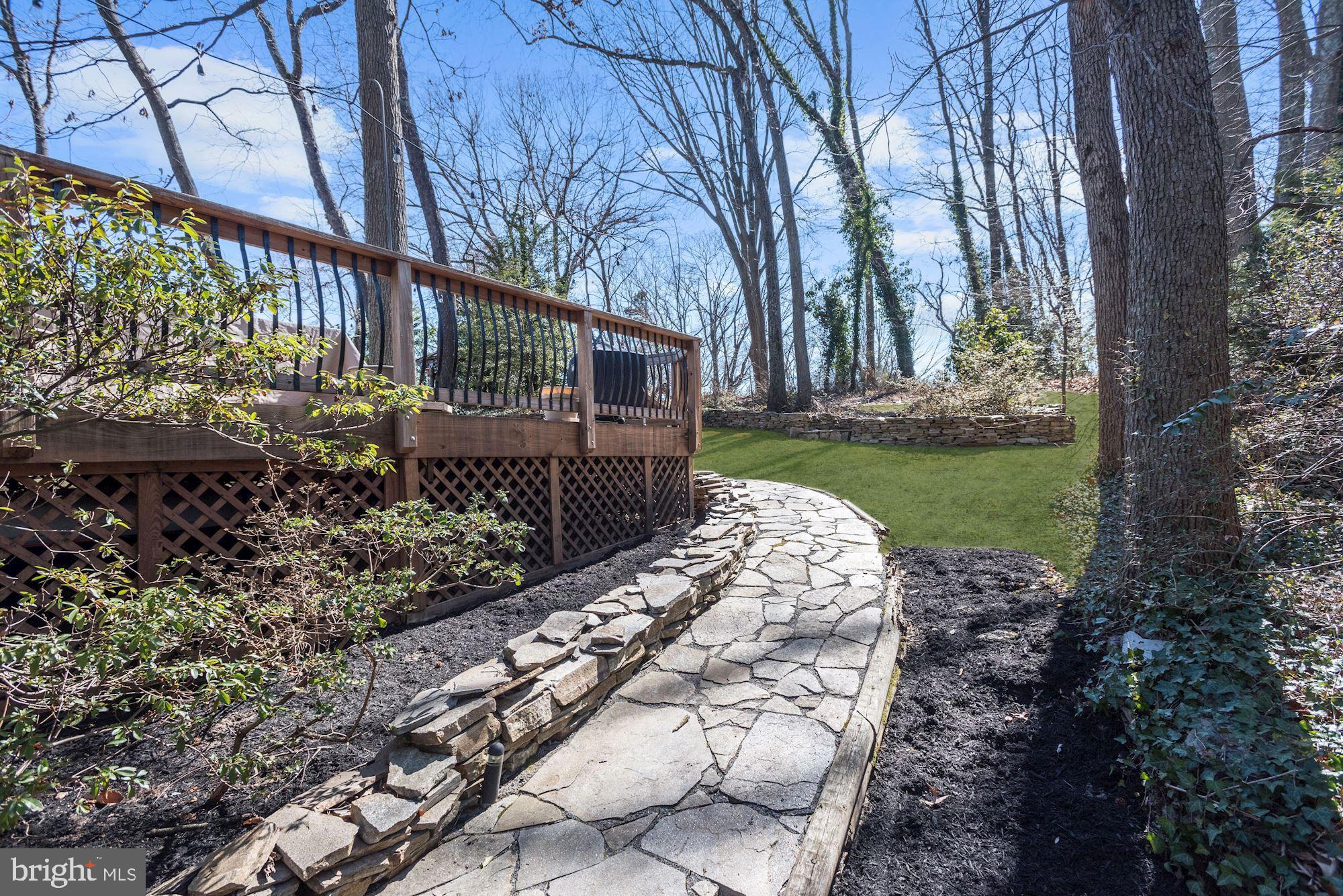334 Edgewater Road Pasadena, MD 21122 - Photo 34 of 42 Backyard and Stone Walkway