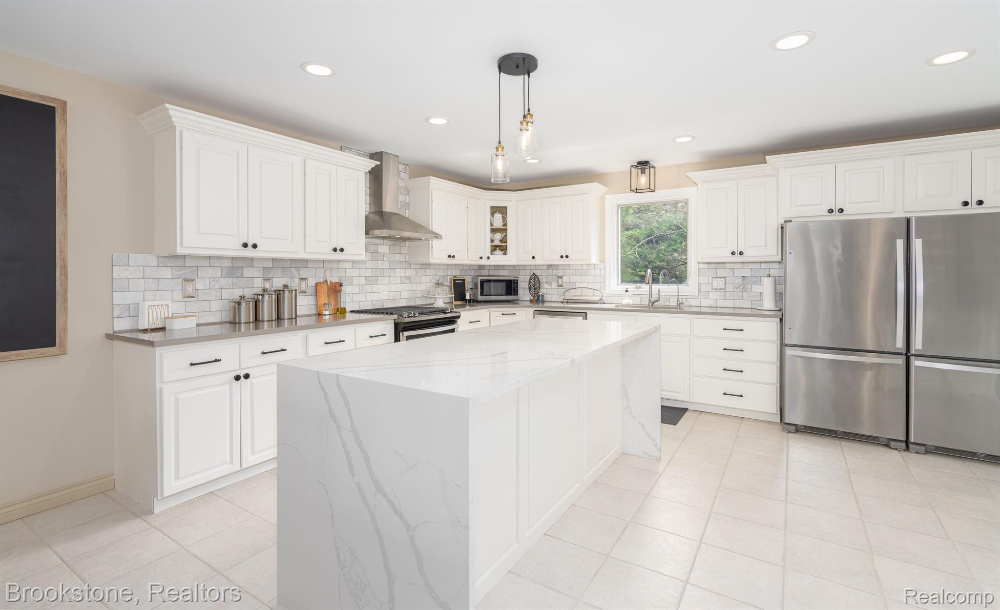 780 East Gunn Road Rochester, MI 48306 - Photo 15 of 56 Entertainer's dream kitchen with double-fridge