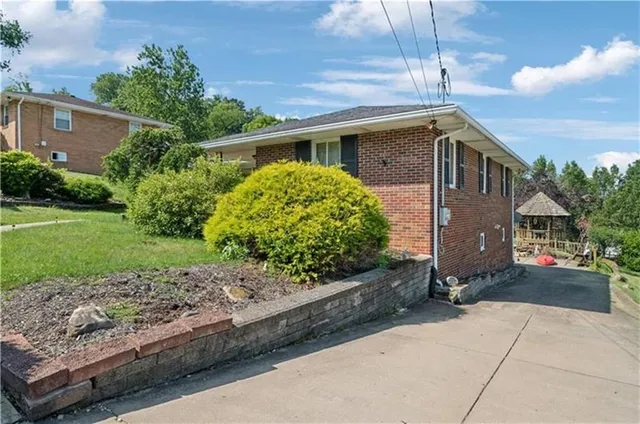a view of a house with garden