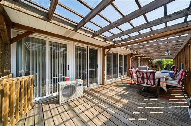 a outdoor space with lounge chair and barbeque