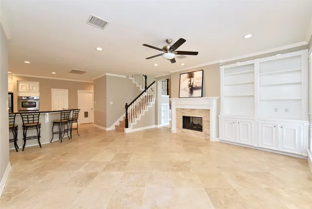 a view of entryway with wooden floor and stairs