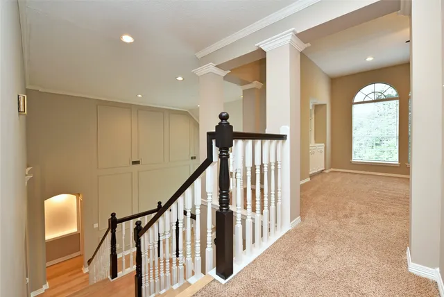 a view of an empty room with a ceiling fan