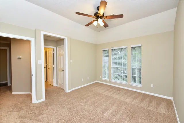 a view of a room with a flat screen tv