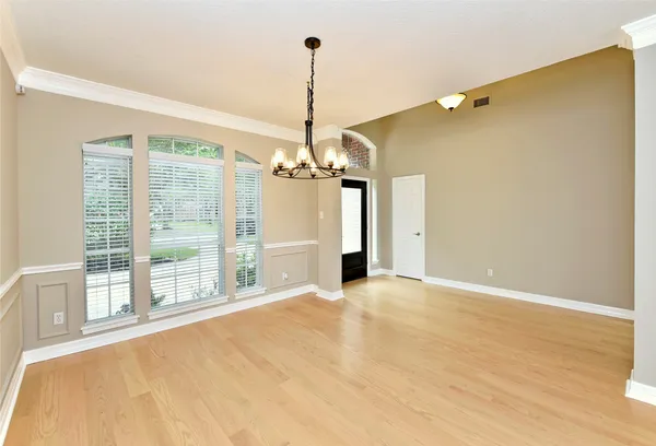 a view of a room with lots of gym equipment