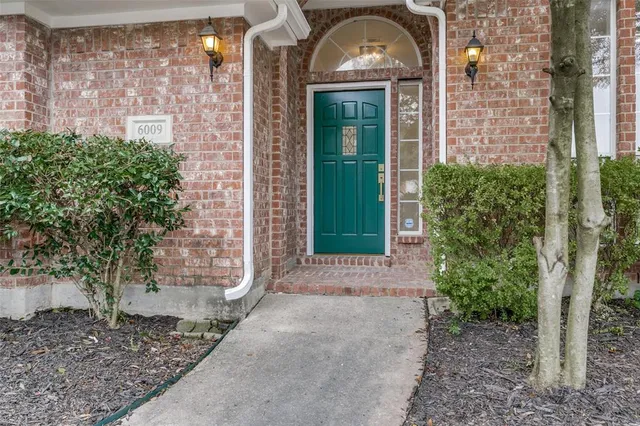 a view of entrance gate of a house