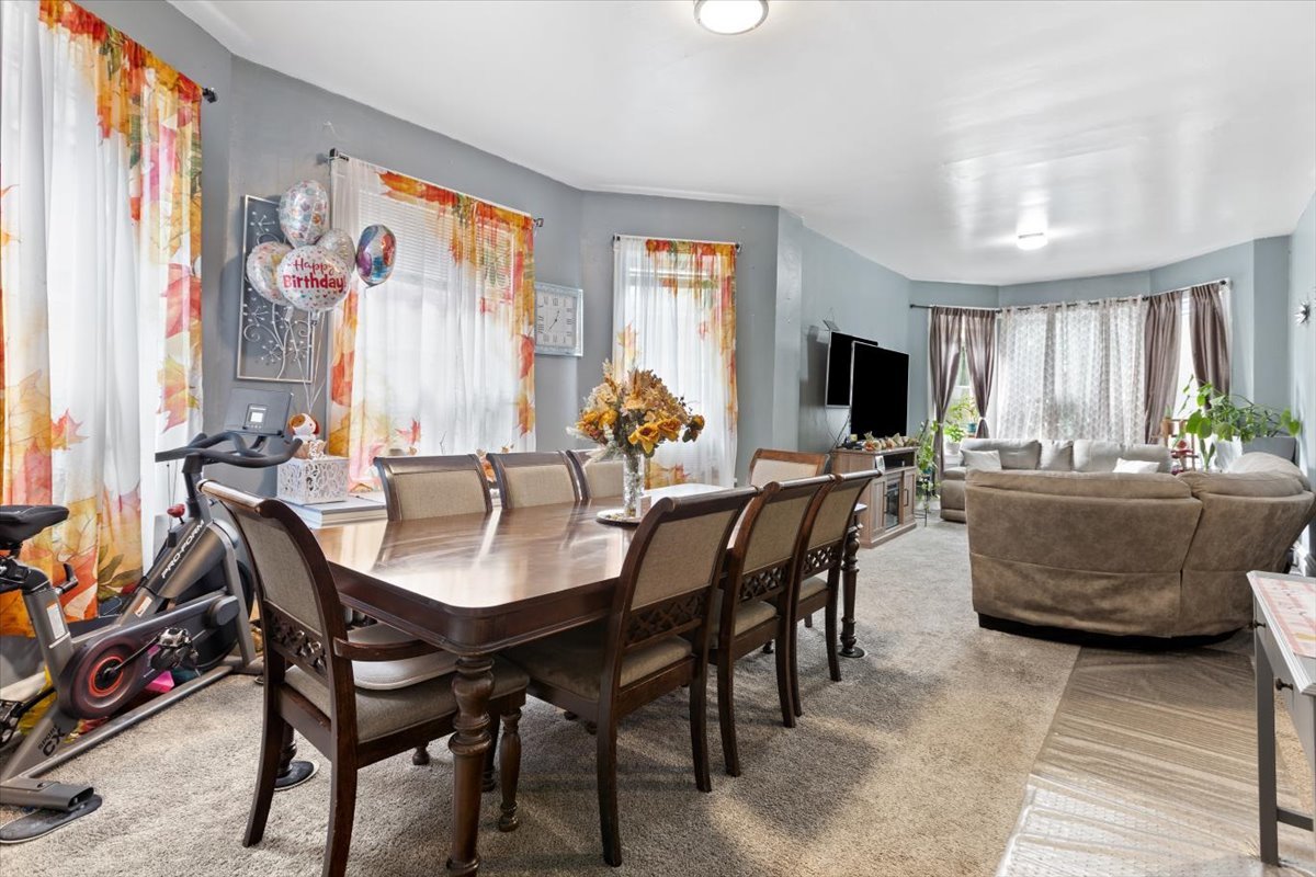 3911 North Kedzie Avenue Chicago, IL 60618 - Photo 25 of 35 a dining room with furniture and window