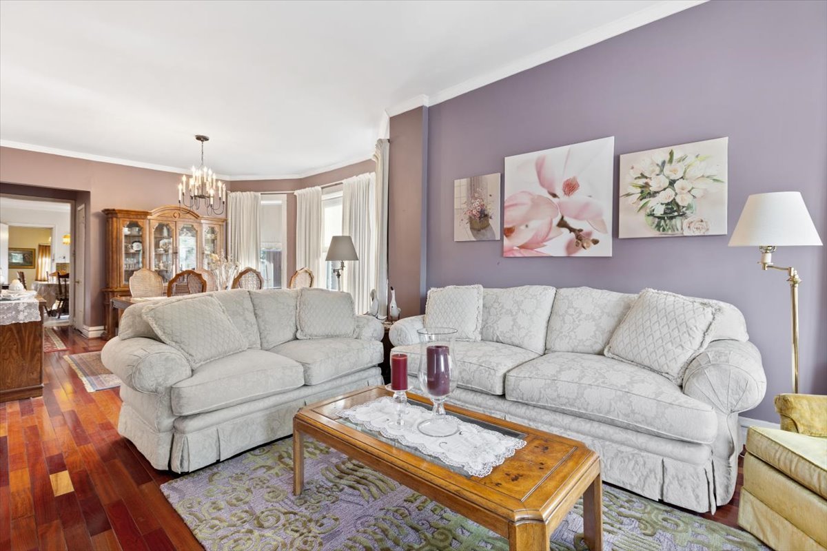 3911 North Kedzie Avenue Chicago, IL 60618 - Photo 6 of 35 a living room with furniture and wooden floor