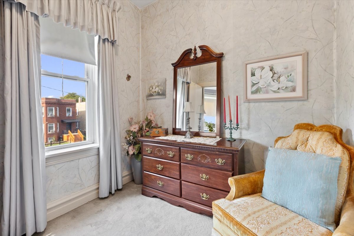 3911 North Kedzie Avenue Chicago, IL 60618 - Photo 8 of 35 a living room with furniture and a window