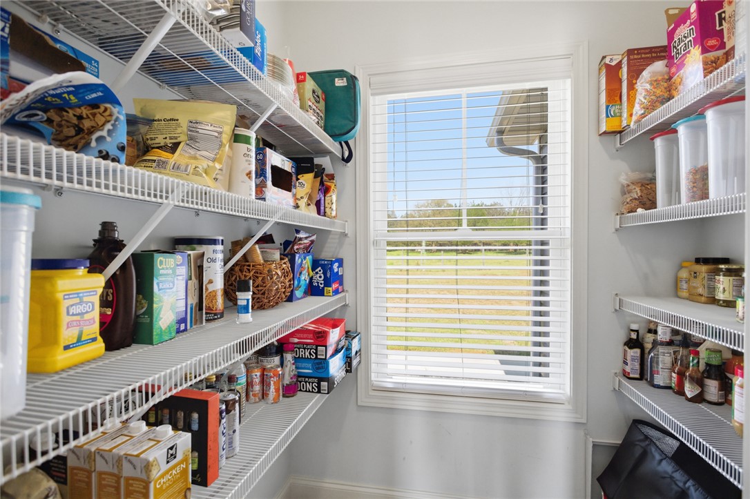 426 Oak Creek Road Seneca, SC 29678 - Photo 15 of 50 This spacious pantry provides convenient storage with ample shelving and natural light.