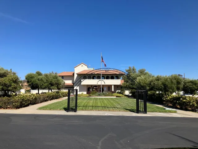 a view of a park with welcome board