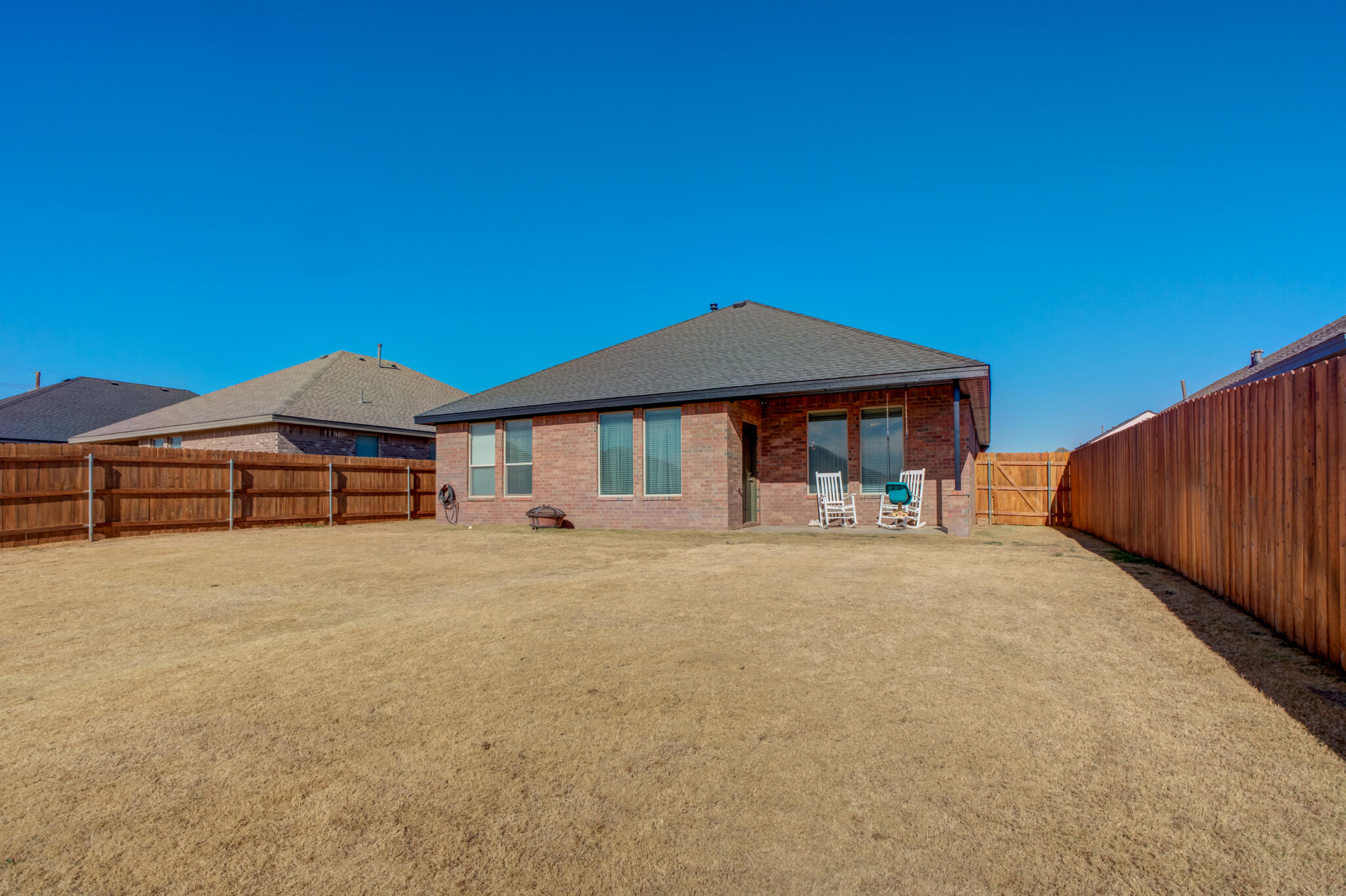 7813 88th Street Lubbock, TX 79424 - Photo 21 of 21 a front view of a house with yard
