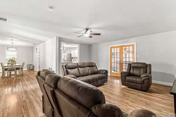 a living room with furniture and a window