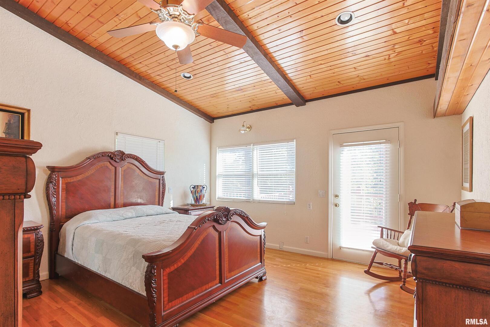 2115 North Lick Creek Road Goreville, IL 62939 - Photo 11 of 28 a bed room with a bed and a chair