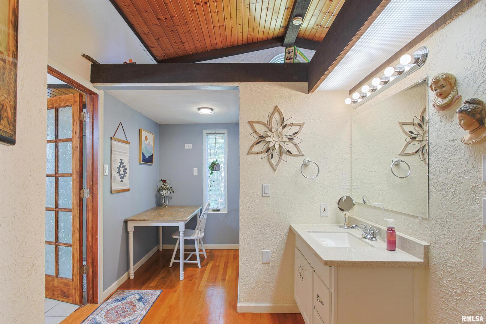 2115 North Lick Creek Road Goreville, IL 62939 - Photo 13 of 28 a bathroom with a sink and a mirror