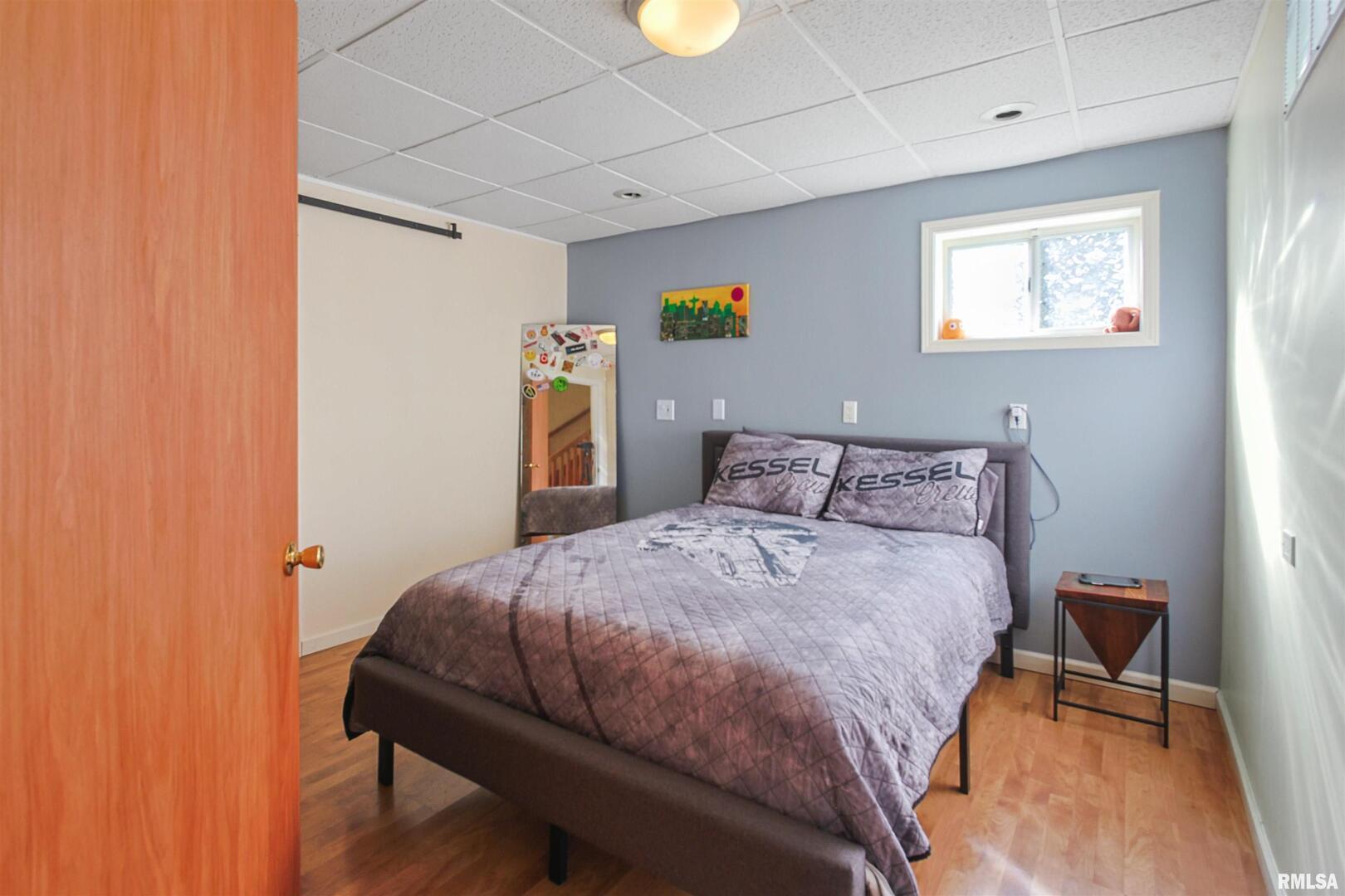 2115 North Lick Creek Road Goreville, IL 62939 - Photo 18 of 28 a bedroom with a bed and a window