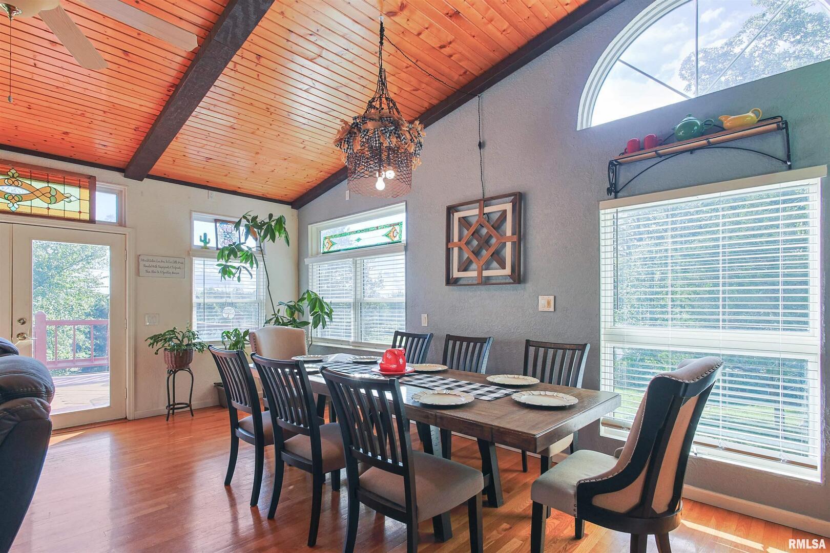 2115 North Lick Creek Road Goreville, IL 62939 - Photo 8 of 28 a view of a dining room with furniture window and outside view