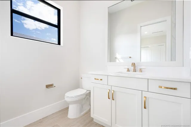 a bathroom with a sink a toilet and a bathtub