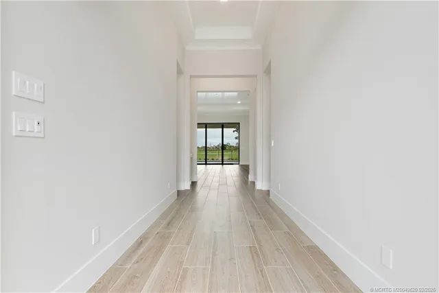 a view of a glass door and porch