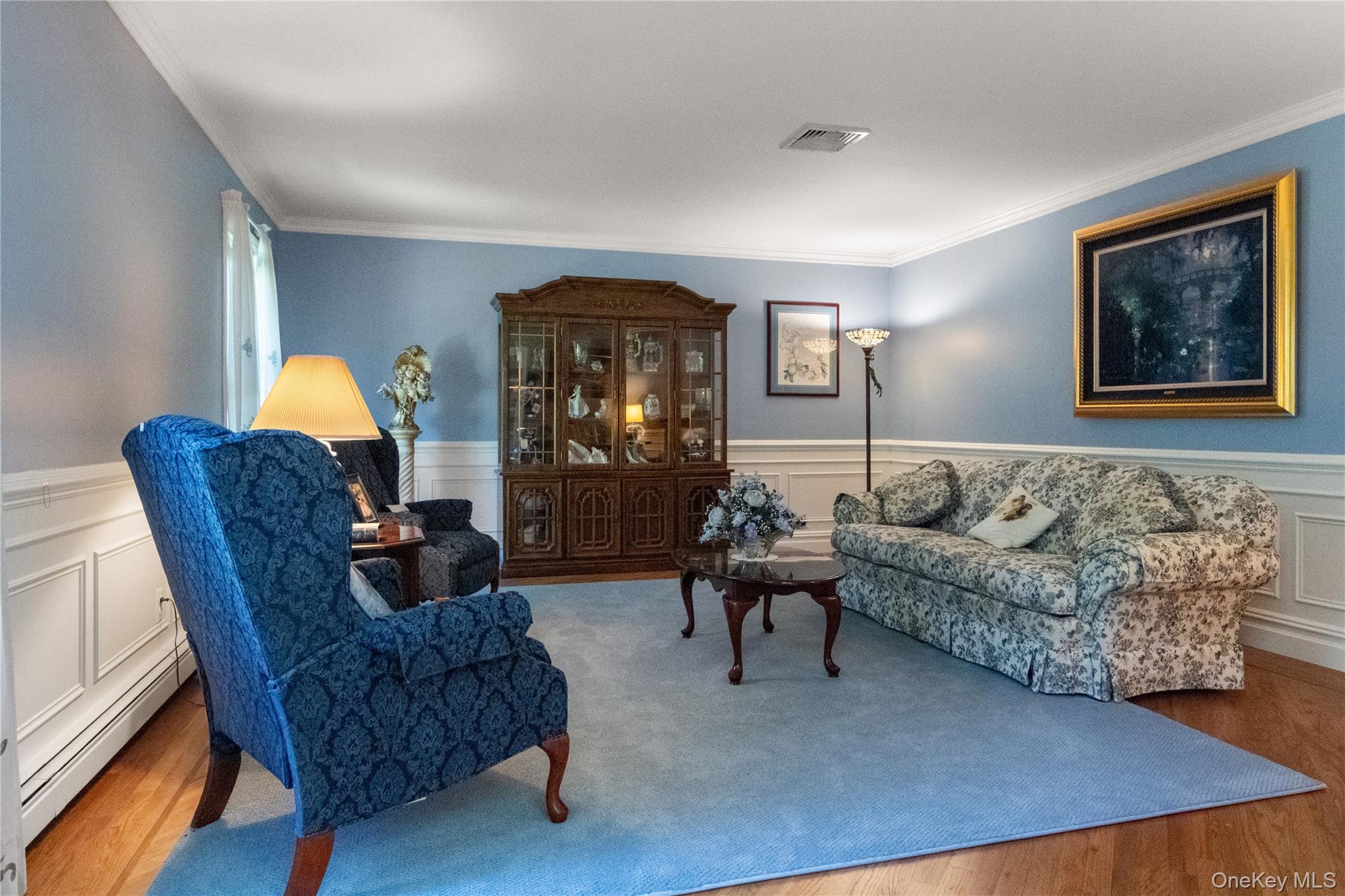 214 West Mombasha Road Monroe, NY 10950 - Photo 6 of 43 a living room with furniture a lamp and a window