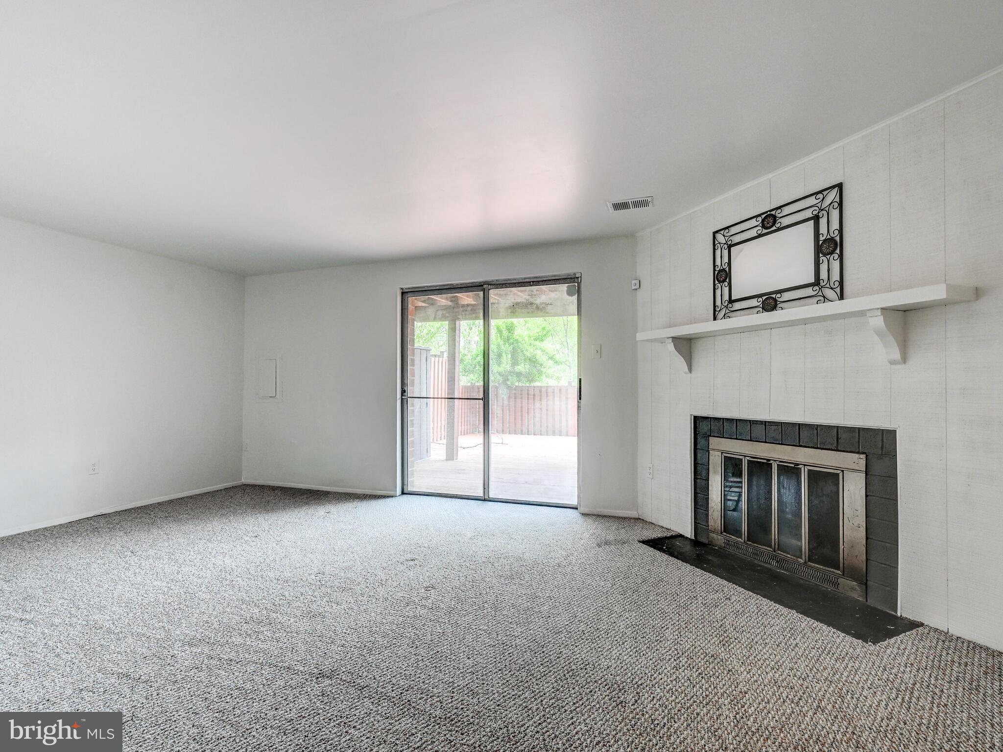 7230 Lasting Light Way Columbia, MD 21045 - Photo 16 of 27 FAMILY ROOM WITH WOOD BURNING FIREPLACE