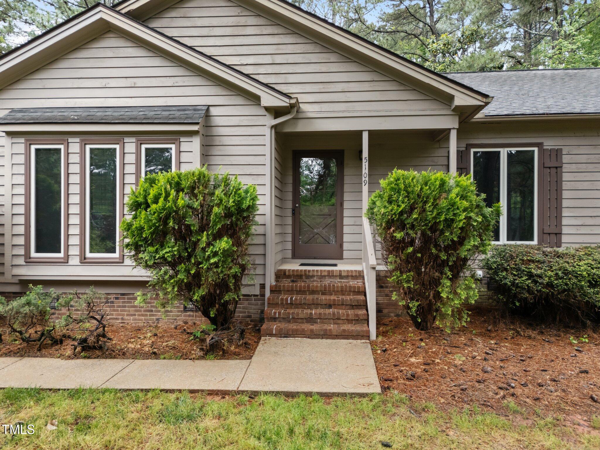 5109 Knaresborough Road Raleigh, NC 27612 - Photo 4 of 35 34-web-or-mls-DJI_20250505160015_0610_D