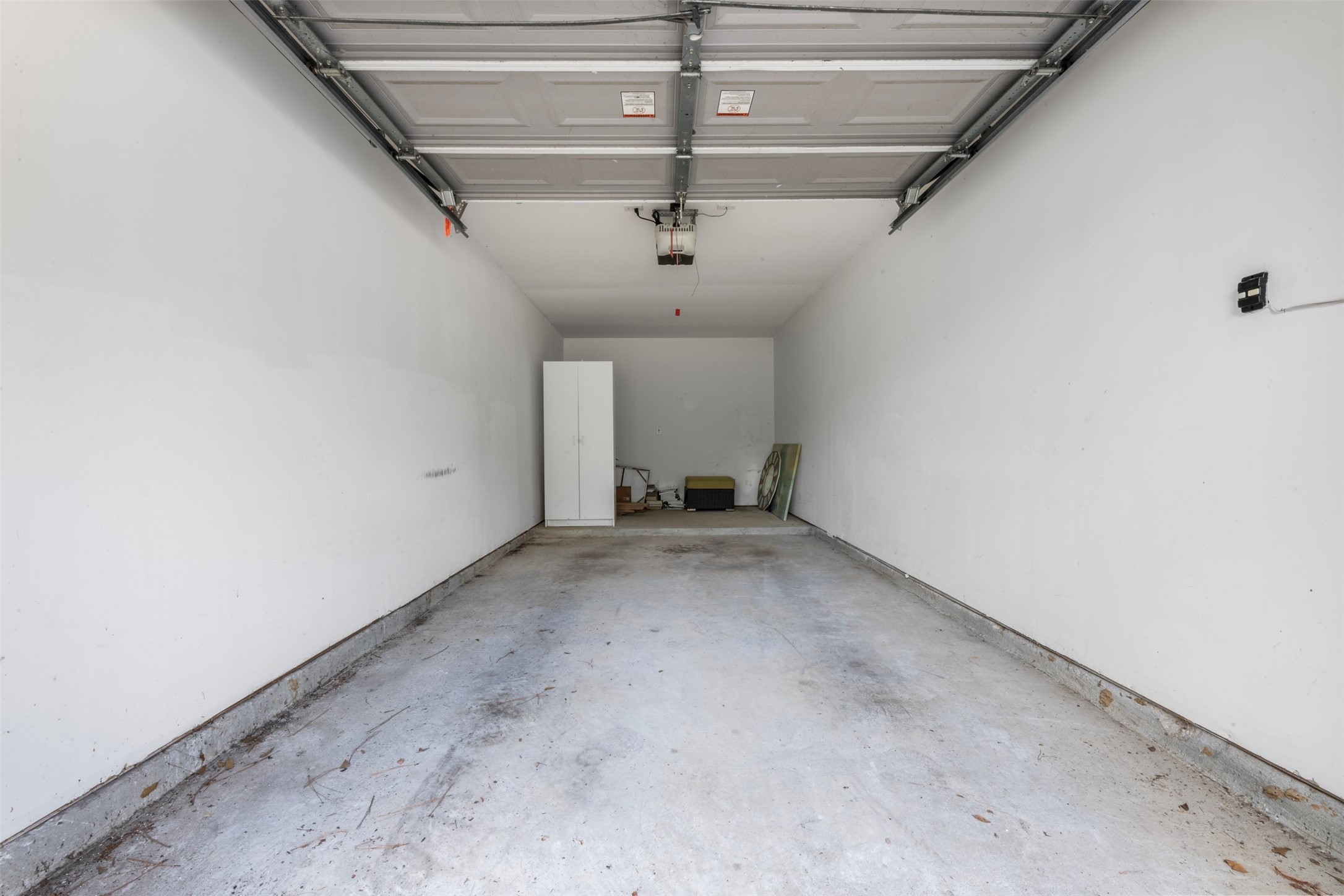 8051 Bay Branch Drive, Unit 423 Spring, TX 77382 - Photo 24 of 29 Inside of private garage parking or storage