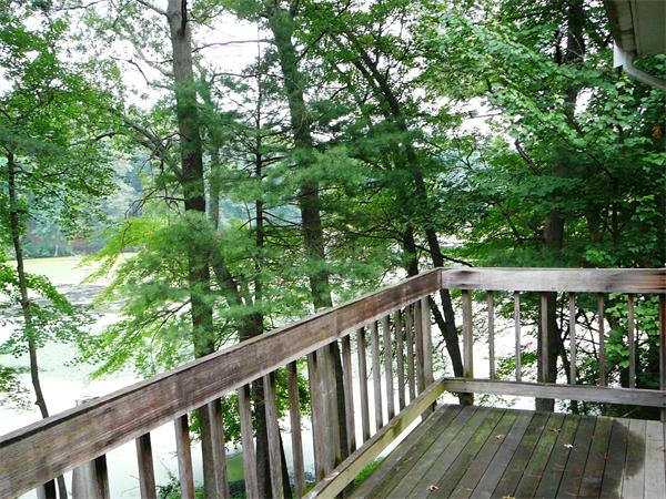 499 Dutton Road Sudbury, MA 01776 - Photo 14 of 21 a view of balcony with deck and wooden floor