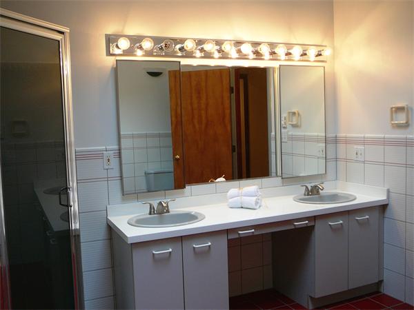 499 Dutton Road Sudbury, MA 01776 - Photo 16 of 21 a bathroom with a sink and mirror