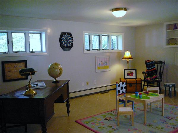 499 Dutton Road Sudbury, MA 01776 - Photo 17 of 21 a living room with furniture and wooden floor