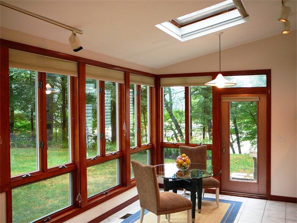 499 Dutton Road Sudbury, MA 01776 - Photo 8 of 21 a dining room with furniture large windows and wooden floor