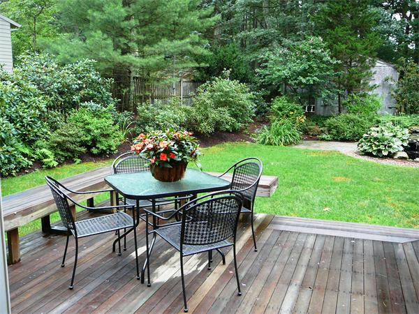 499 Dutton Road Sudbury, MA 01776 - Photo 10 of 21 a dining room with furniture and garden