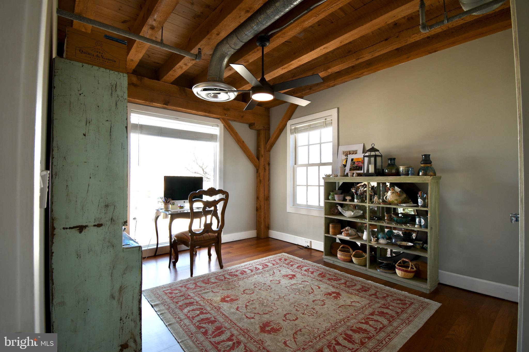 26 East Lancaster Avenue, Unit R3 Downingtown, PA 19335 - Photo 17 of 25 a view of a livingroom with furniture and a rug