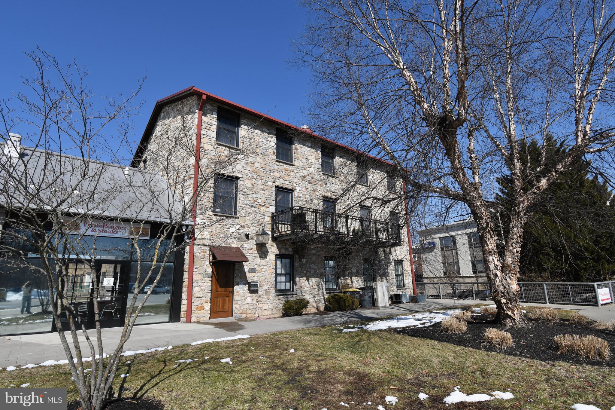 26 East Lancaster Avenue, Unit R3 Downingtown, PA 19335 - Photo 2 of 25 a front view of a building with street view