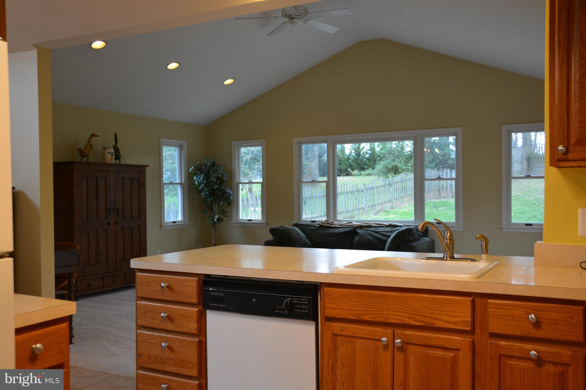 8942 Victoria Road Springfield, VA 22151 - Photo 10 of 25 a kitchen with a sink and large window