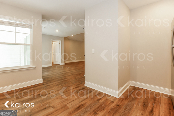 153 Cottage Grove Road Brunswick, GA 31525 - Photo 8 of 16 a view of empty room with wooden floor