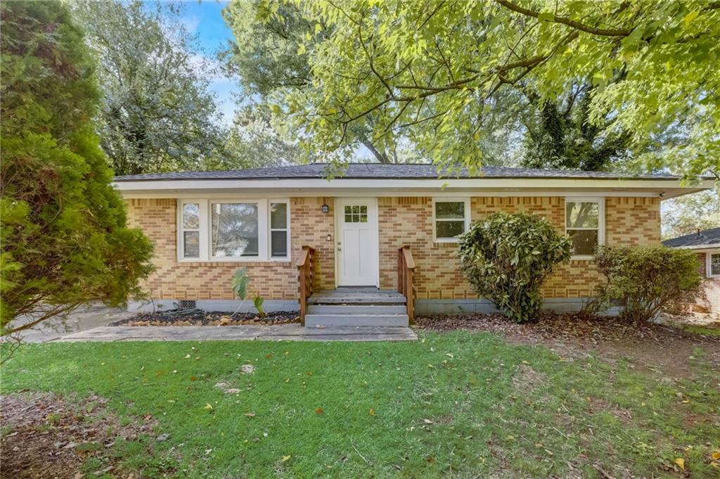 2173 Brannen Road Southeast Atlanta, GA 30316 - Photo 1 of 1 front view of house with a yard