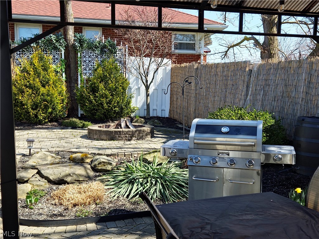 1681 Rush Road Wickliffe, OH 44092 - Photo 30 of 33 View of patio / terrace featuring a fire pit