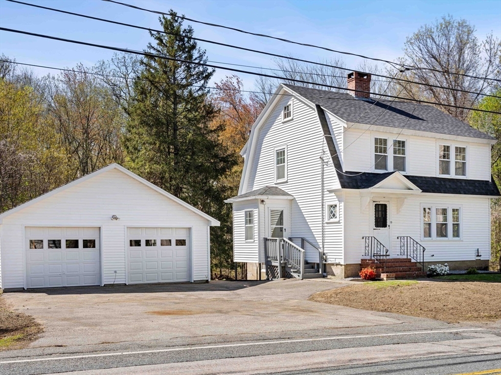 15 Middle Road Amesbury, MA 01913 - Photo 1 of 16 a view of a big house with a street