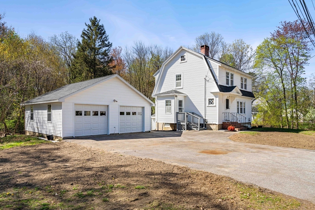 15 Middle Road Amesbury, MA 01913 - Photo 2 of 16 a view of a house with a yard