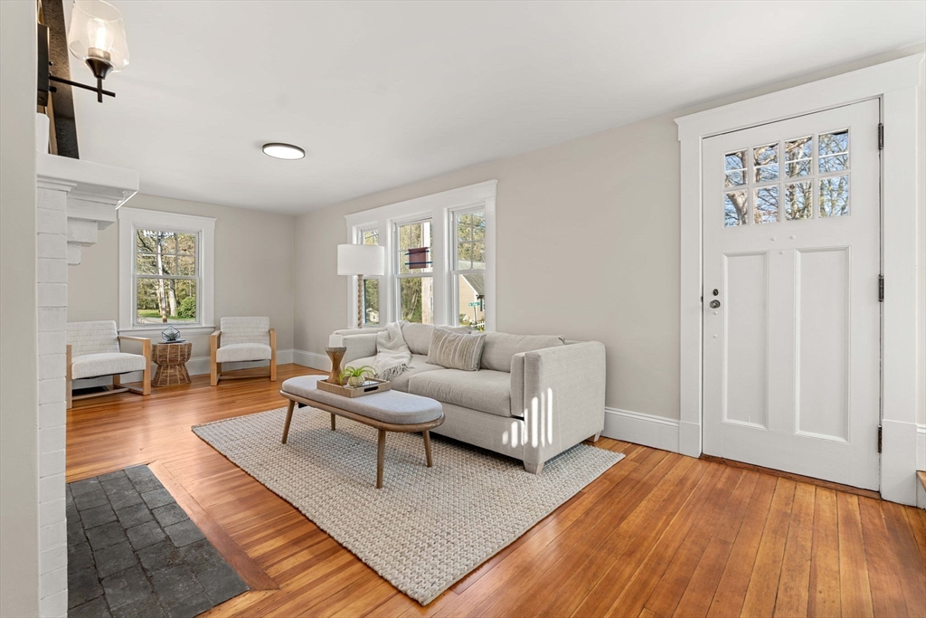15 Middle Road Amesbury, MA 01913 - Photo 7 of 16 a living room with furniture and a wooden floor