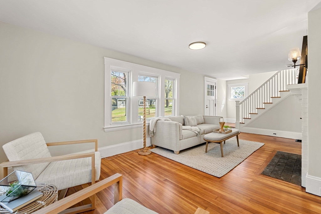 15 Middle Road Amesbury, MA 01913 - Photo 8 of 16 a living room with furniture and a rug