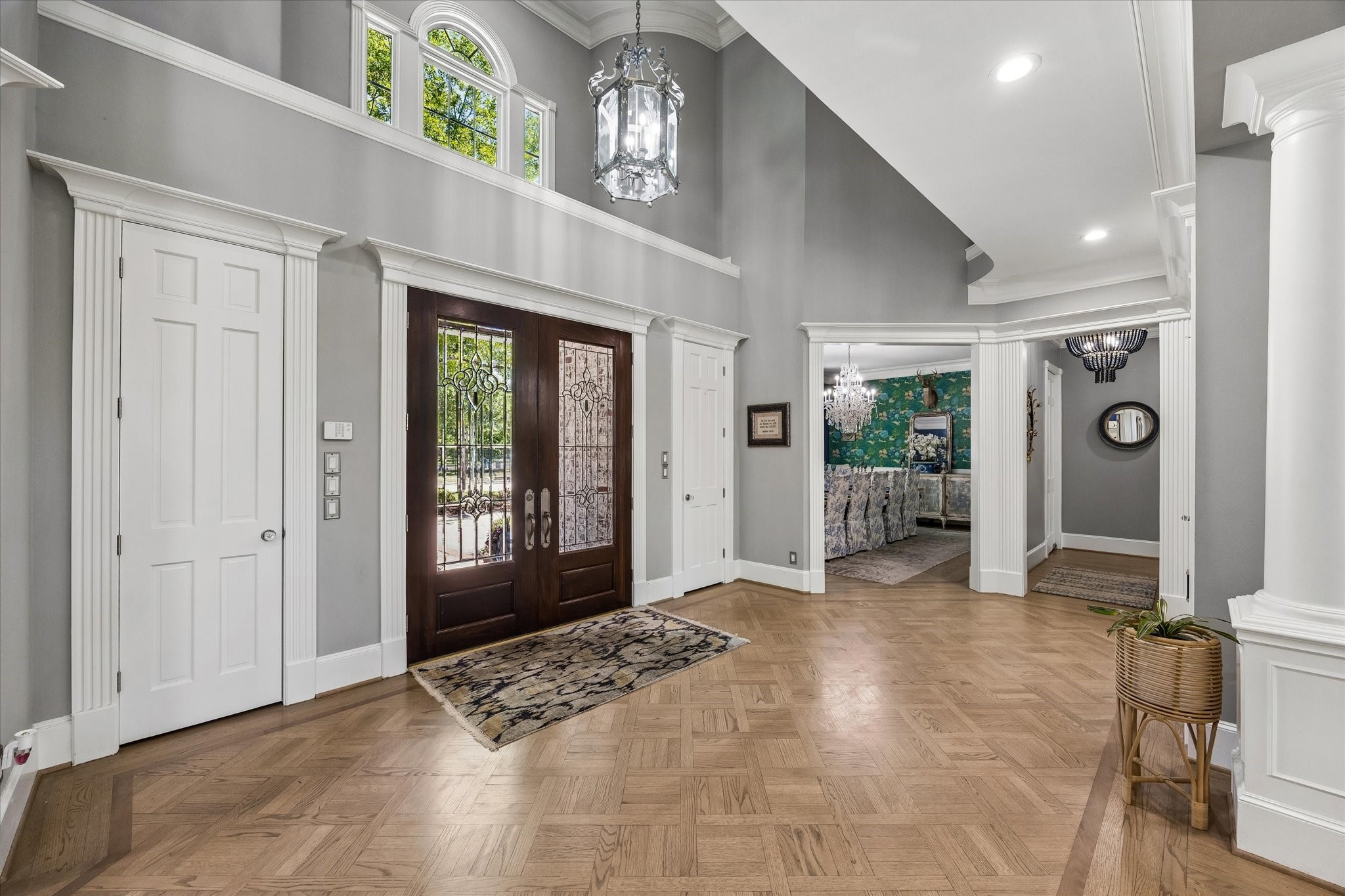 597 Piney Point Road Piney Point Village, TX 77024 - Photo 2 of 39 Elegant entry with hardwood floors and high ceilings. Two coat closets.