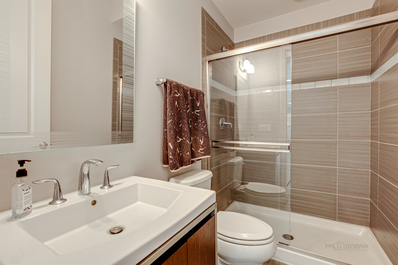 1120 Ashley Lane Inverness, IL 60010 - Photo 17 of 46 a bathroom with a sink a toilet and shower